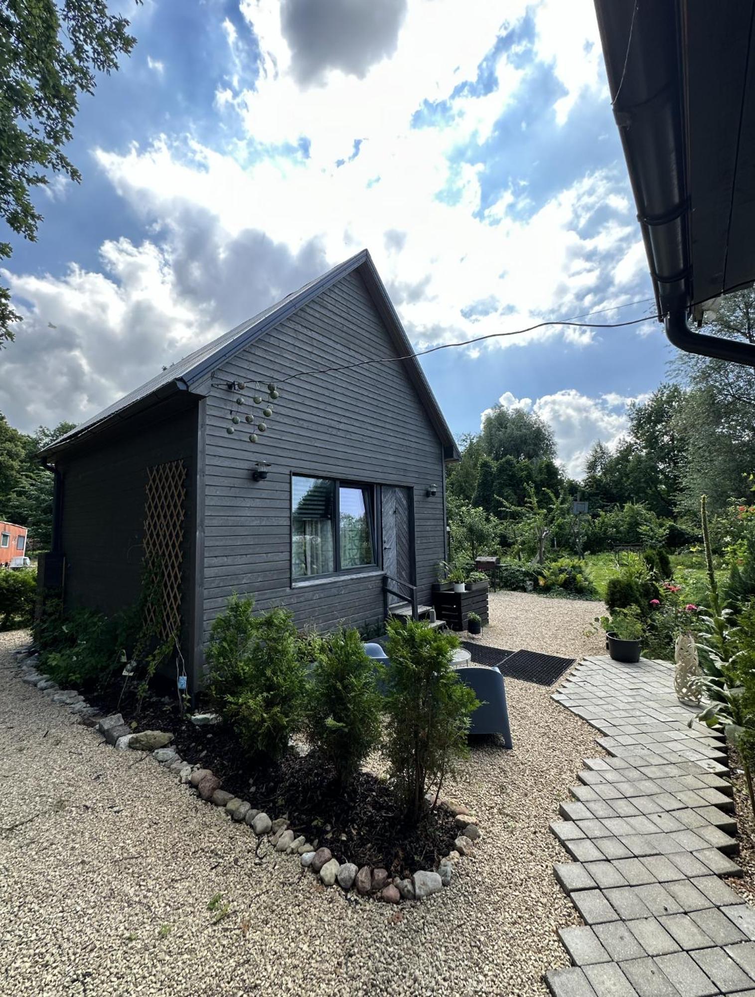Вилла Amazing Little House On An Island With Garden Рига Экстерьер фото